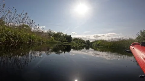 Kayaking through a canal system Stock Footage 243594532