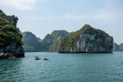 Kayaking Through Limestone Karsts in Ha Long Bay Vietnam 스톡 사진