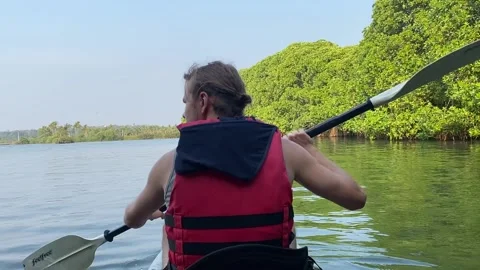 Kayaking turn boy Stock Footage 234697525