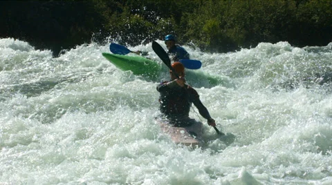Kayaking in white water, super slow motion Stock Footage