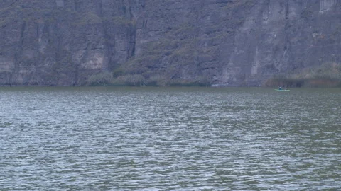 Kayaking in the Yambo lagoon in the ecuador Stock Footage 230106454