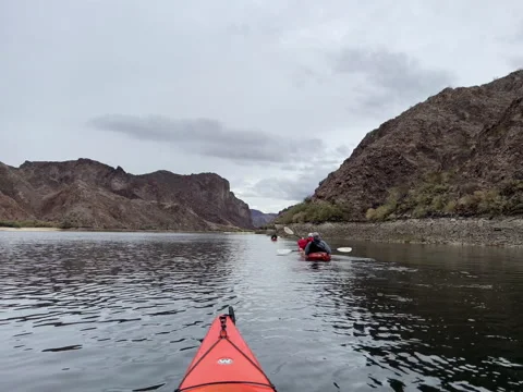 Kayaks in canyon river Stock Footage 277912985