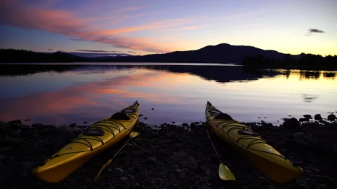 Kayaks at dusk. Stock Footage 132051620