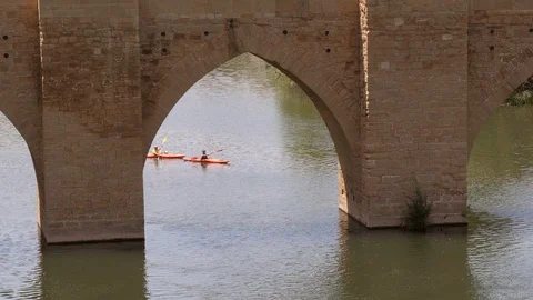 Kayak‘s paddle behind bridge on river in La Rioja, Spain Stock Footage 97988276