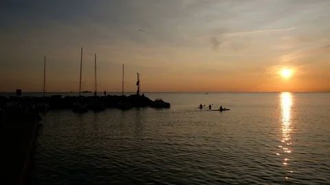 Kayaks at sunset Stock Footage 82083241