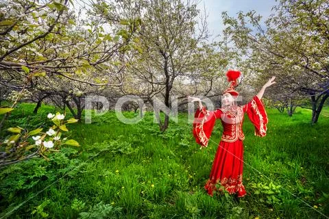Kazakh dancer in traditional costume Stock Photos