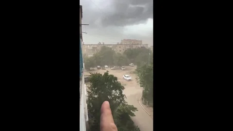Kazakhstan: Hurricane-Force Winds Tear Through Aktobe, Leaving Trail of D... Stock Footage 337393128