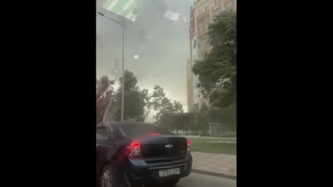 Kazakhstan: Hurricane-Force Winds Tear Through Aktobe, Leaving Trail of D... Stock Footage 337413807