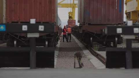 Kazakhstan, Khorgos Gateway, workers between trains Stock Footage 98605424