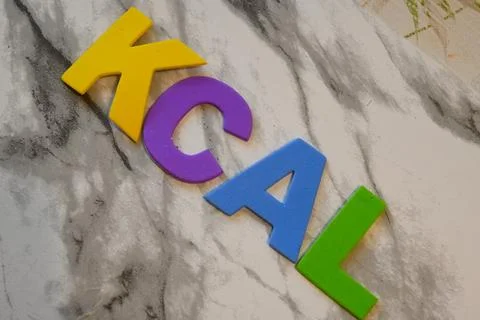 Kcal lettering on marble background Stockfoto's