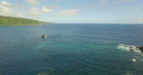 Keanae Aerial Pull Back Over Taro and Bay 02 Stock Footage 74974428