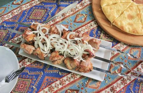 Kebab with bread on the table Stock Photos