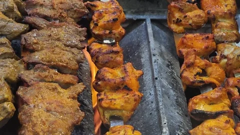 Kebab cooking with chicken, ground beef and lamb  Stock Footage 248672482