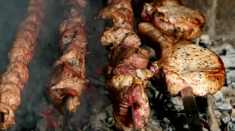 Kebab cooking on the grill over coals Stock Footage 59186036