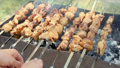 The kebab is fried on the grill. Selective focus. Stock Footage 146988273