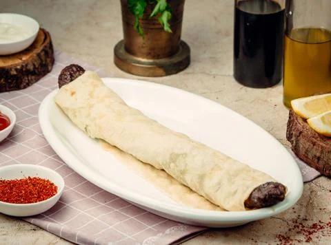 Kebab in lavash on the table Stock Photos