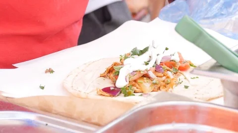 Kebab is made and wrapped Stock Footage 112004155
