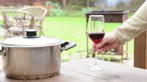 Kebab meat in a pot on a table with a built-in barbecue, dinner outdoors in a ga Video stock 274175714