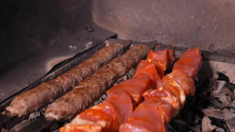 Kebab or kebab made from fresh meat and lula kebab cooked on charcoal grill 스톡 동영상 267297012