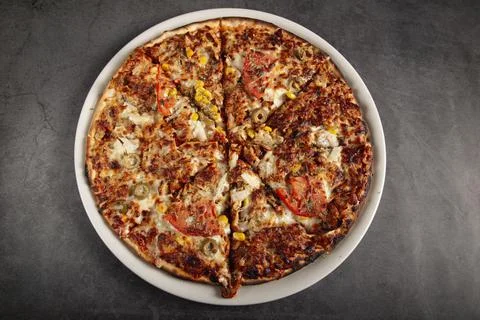 Kebab pizza on dark rustic background. Top view. Stock Photos