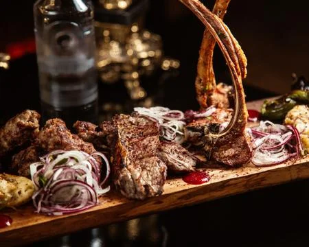 Kebab set with bottle of vodka Stock Photos