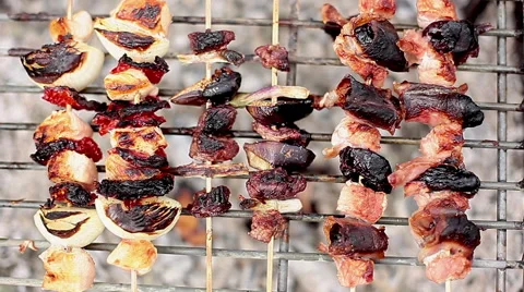 Kebabs cooking on grill Stock Footage 63305766