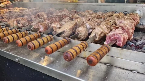 Kebabs on skewers, automatic grill close-up Stock Footage 275641086