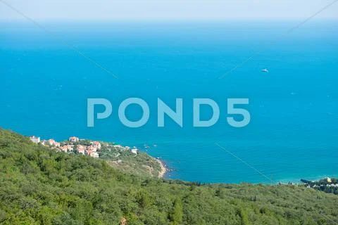 Keen view on a seashore from a high mountain Stock Photos