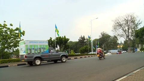 Keep the city of Kigali clean - Pan on Dump trash in the streets -  2 clips Stock Footage 102234941