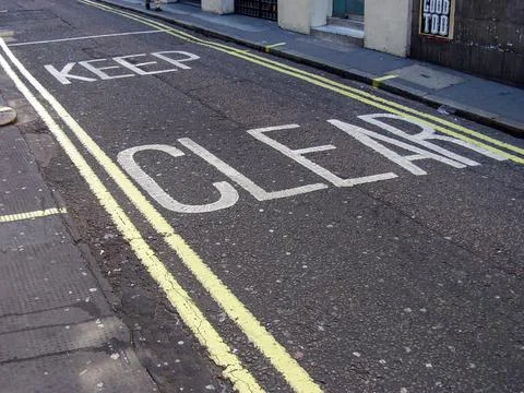 'Keep Clear' road marking Fotos de archivo