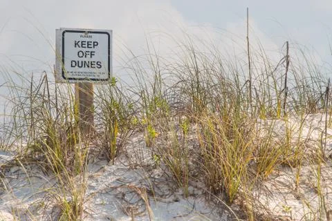 "Keep off Dunes" sign at the beach. Stock Photos