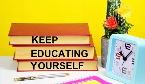 Keep educating yourself. The text inscription of planning on textbooks. Stock Photos