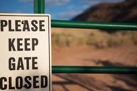Keep gate closed at all times Stock Photos