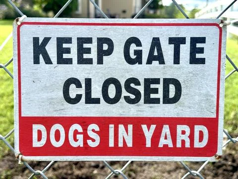 Keep Gate Closed Dogs In Yard sign Stock Photos