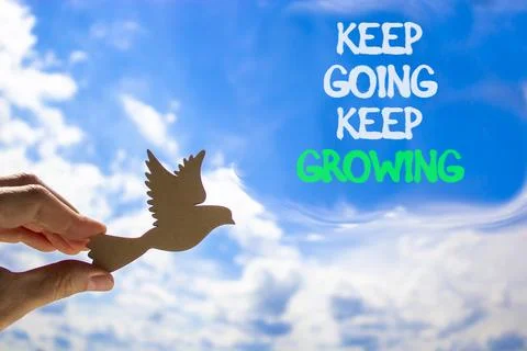 Keep going and growing symbol. Concept words phrase Keep going keep growing.. Foto stock