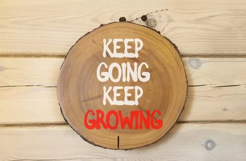 Keep going and growing symbol. Concept words phrase Keep going keep growing.. Stockfoto's
