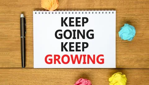 Keep going and growing symbol. Concept words phrase Keep going keep growing.. Stock Photos
