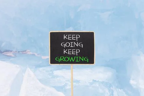 Keep going and growing symbol. Concept words phrase Keep going keep growing.. Foto stock
