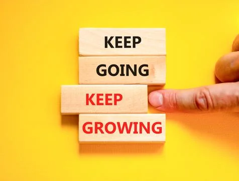 Keep going and growing symbol. Concept words phrase Keep going keep growing.. Stockfoto's