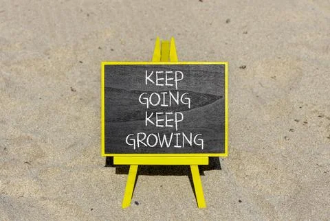 Keep going and growing symbol. Concept words phrase Keep going keep growing.. Stock Photos