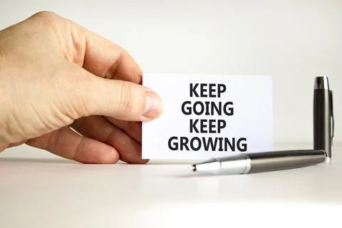 Keep going and growing symbol. Concept words phrase Keep going keep growing.. Foto stock