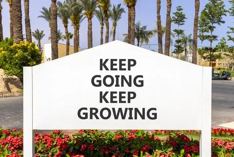 Keep going and growing symbol. Concept words phrase Keep going keep growing.. Stockfoto's