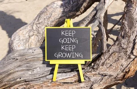 Keep going and growing symbol. Concept words phrase Keep going keep growing.. Stock Photos