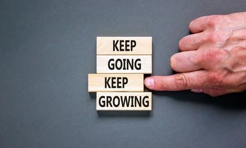 Keep going and growing symbol. Concept words phrase Keep going keep growing.. Stockfoto's
