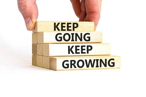 Keep going and growing symbol. Concept words phrase Keep going keep growing.. Stock Photos