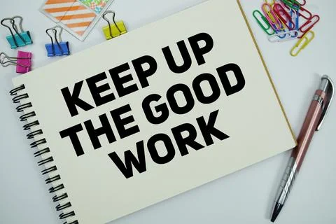 Keep Up The Good Work text message written on notepad with stationery flat .. Stock Photos