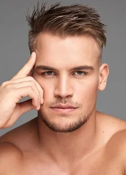 Keep it cool, always composed. Studio shot of a handsome young man posing Stock Photos