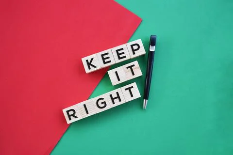 'Keep it right' word on wood block flat lay concept. Stock Photos
