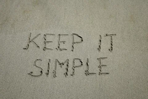 Keep it simple. Inspiration and motivation quote 'keep it simple' with red leaf Foto stock