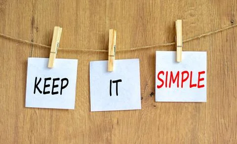 Keep it simple symbol. Concept word Keep it simple on beautiful white paper.. Stock Photos